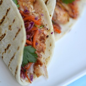 Taco Bar: Grilled BBQ Chicken Strips with Colorful Slaw and Jalapeño Accents
