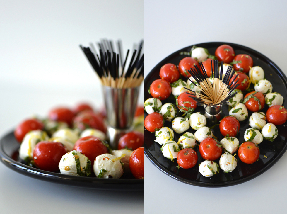 fresh mozzarella cheese board with herbs and tomatoes