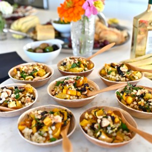 Roasted Delicata Squash party recipe served in small, bamboo bowls.