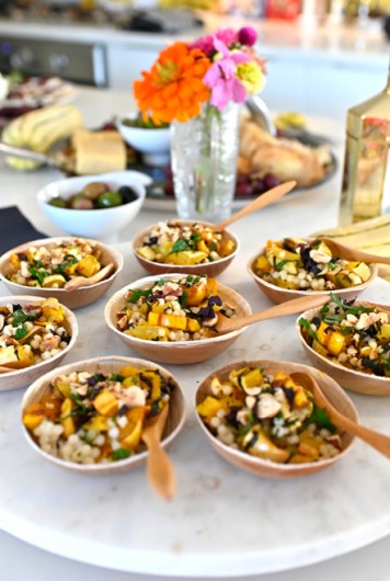 Roasted Delicata Squash party recipe served in small, bamboo bowls.
